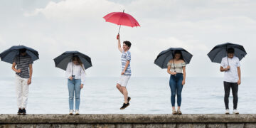 youth with umbrellas